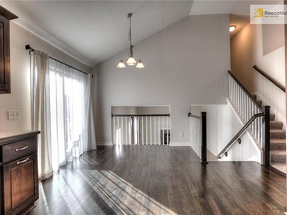 Wood floors flow through out the kitchen and dining area