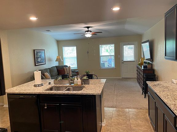 Open concept with kitchen opening to living room