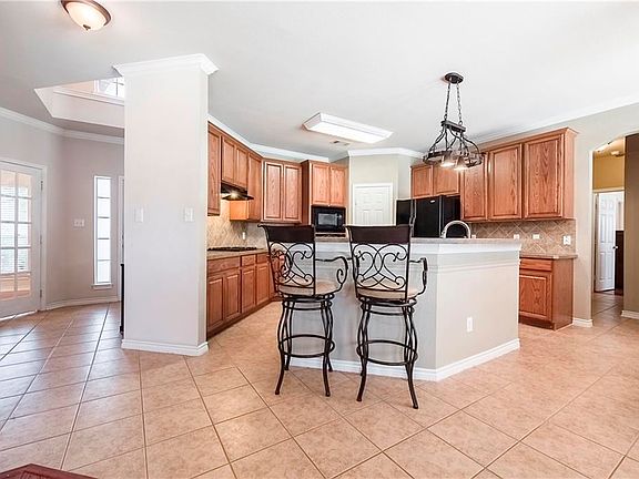 Kitchen is open to living room.