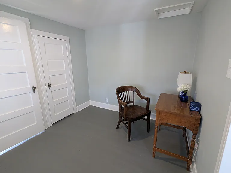 Upstairs bedroom with closet and attached full bath.