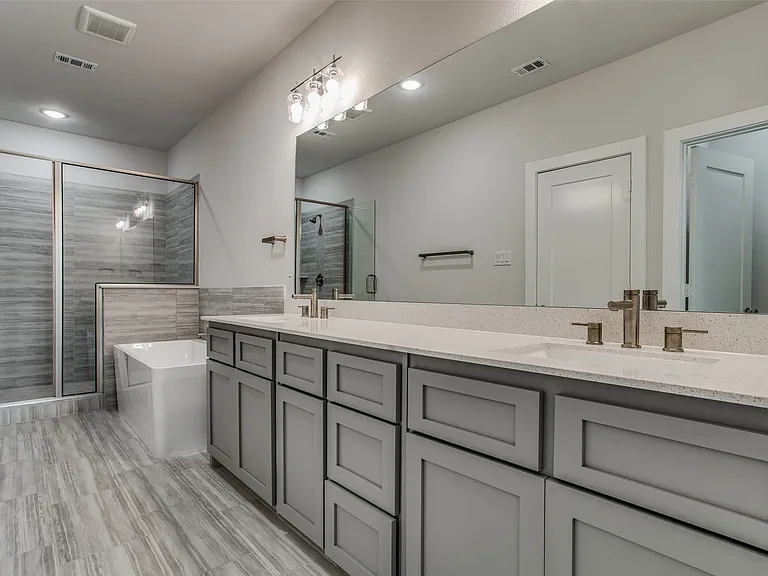Double sinks and great counterspace with ample storage.