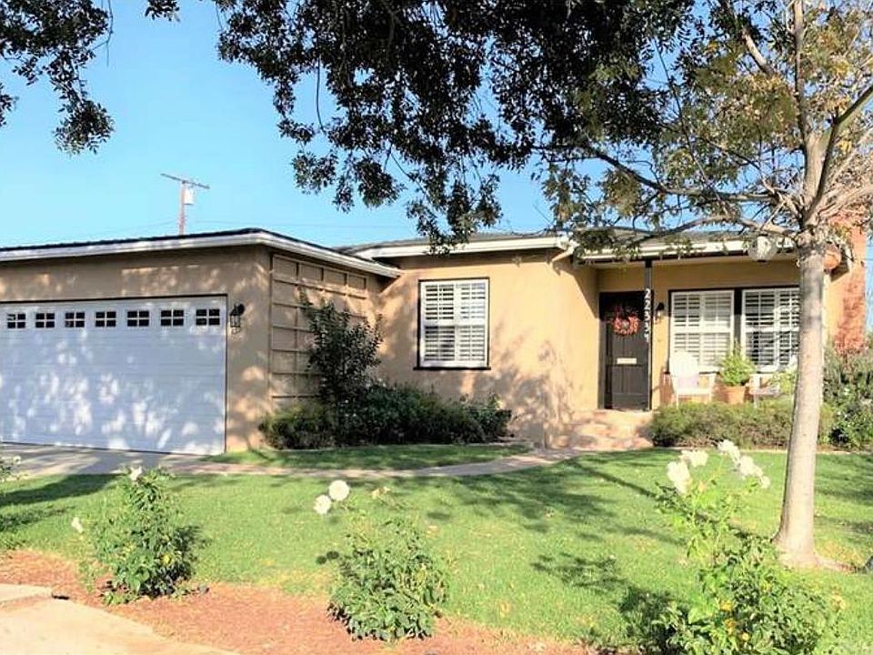 Front Exterior & Attached (2) car garage