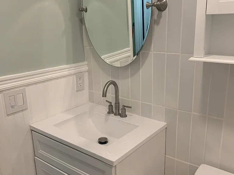 2nd bathroom new mirror and canity.
