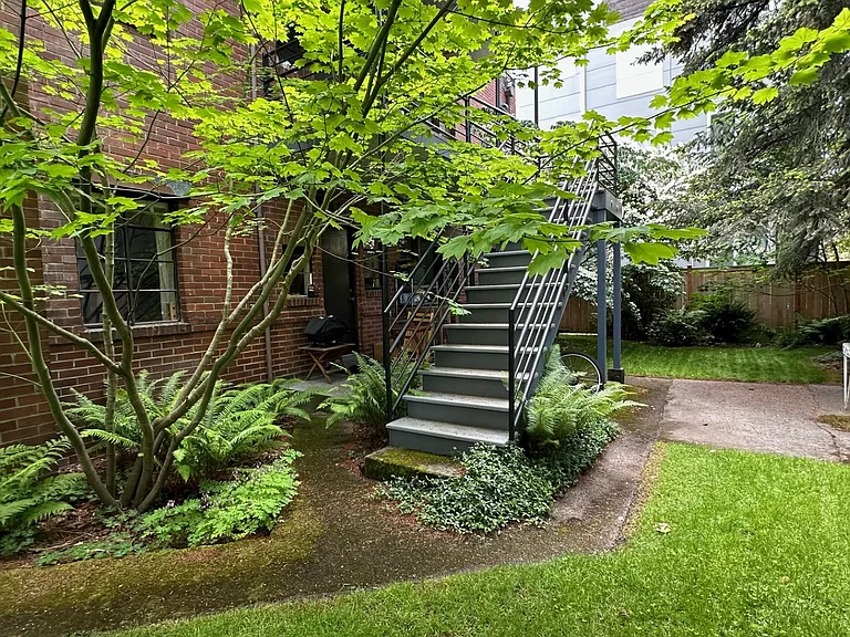 Backyard showing rear entrance and porch.