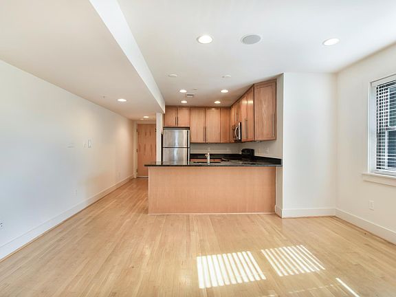 Den looking into kitchen