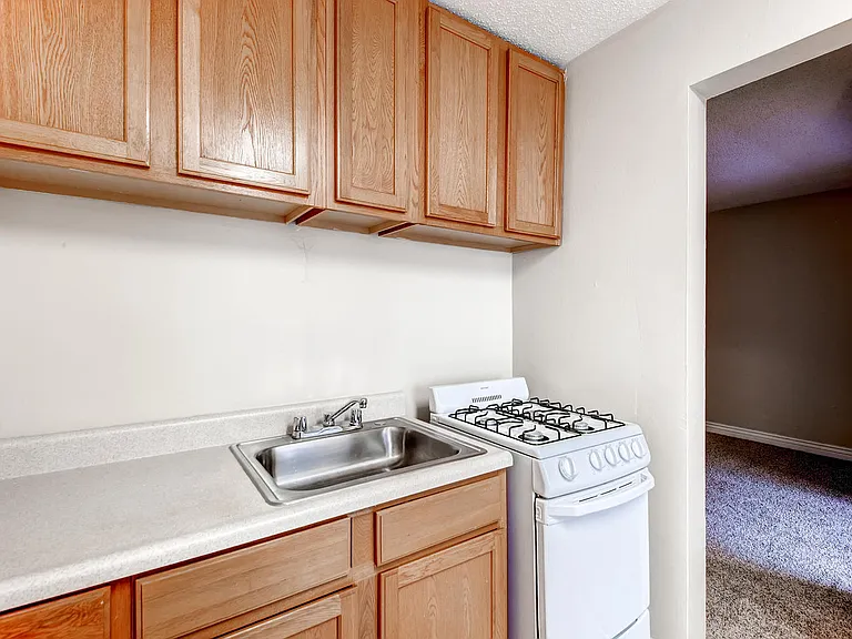 A standard Kitchen at Fountainhead Apartments in Denver, CO