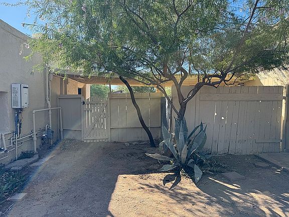 Carport from Yard and Willow