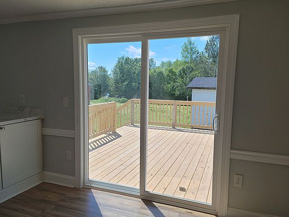 Den View of Large Back Yard