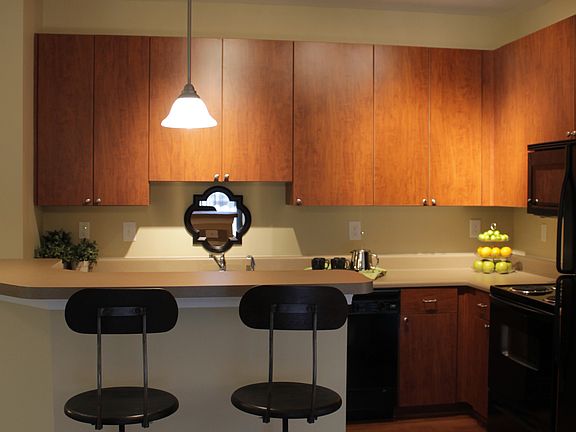 Chef's kitchens, many with islands