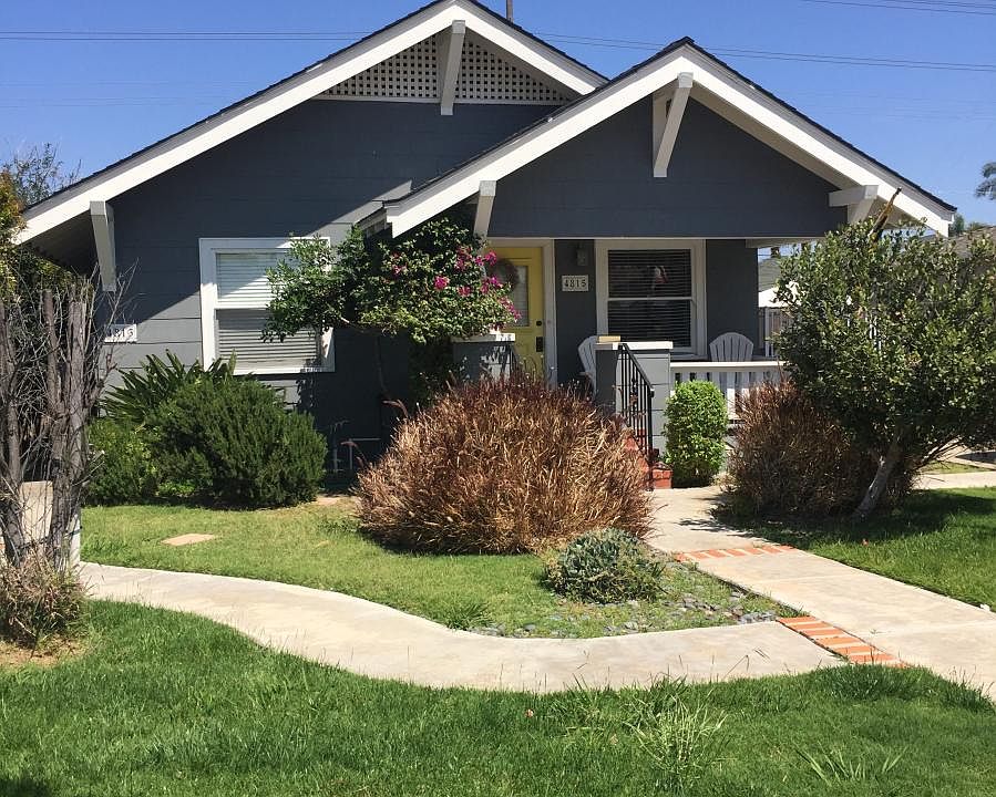 Front of house. Fenced back yard with one car detached gara