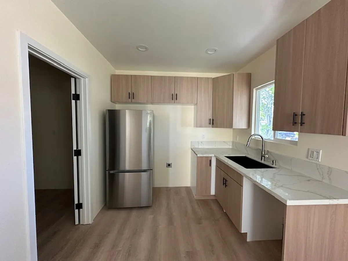 Building Photo - 9722 Natick Ave #1/2