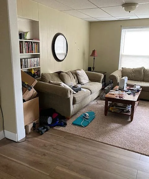 View into the living room from the dining room(Staged in Photo)