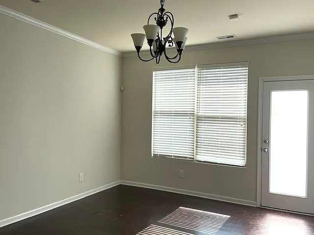 Living room with door out to back patio