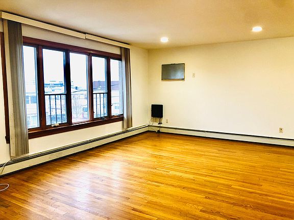LIVING-ROOM AND DINNING-ROOM AREA.