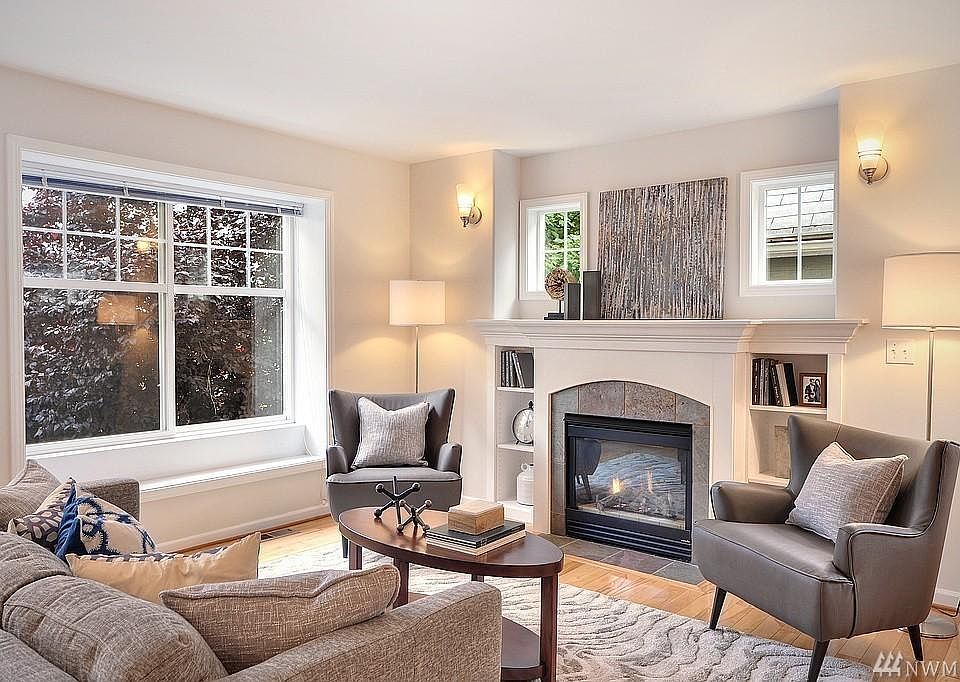 Warm sunlit living room in contemporary Capitol Hill home. Ample sunlight, 2 parking spots, ACs in every room, 3 ensuite bathrooms, and excellent location (Walk Score 89)