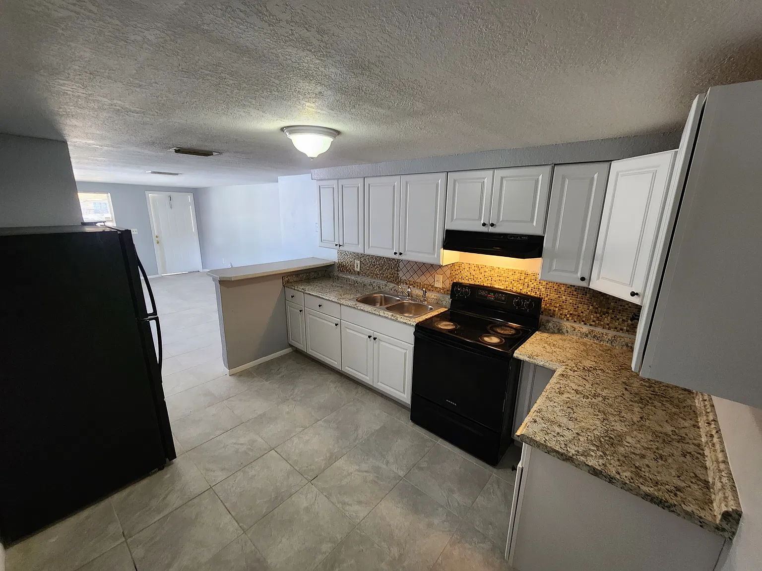 607 58th Avenue Drive East - 609 — Photo 3