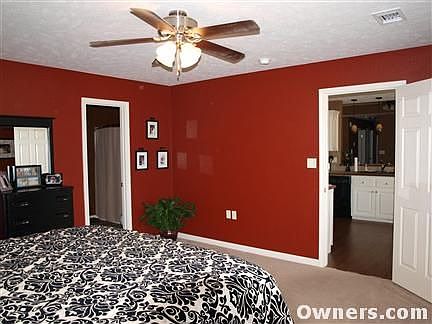 Master Bedroom looking out into kitchen.