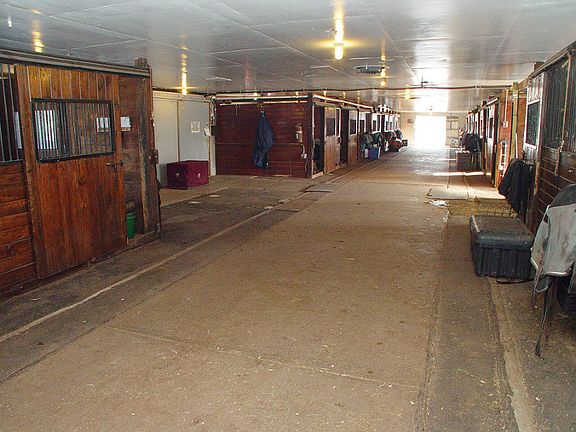 Interior of block barn w/21 stalls