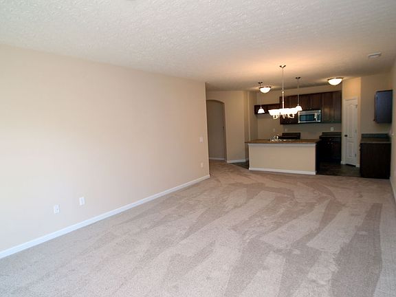 The Bentree III Great Room with carpet