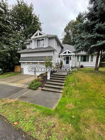 View of beautiful home from road_10062021