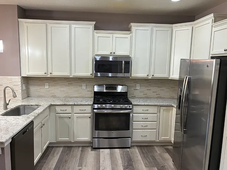 9077 E Phillips Ln — Photo 7