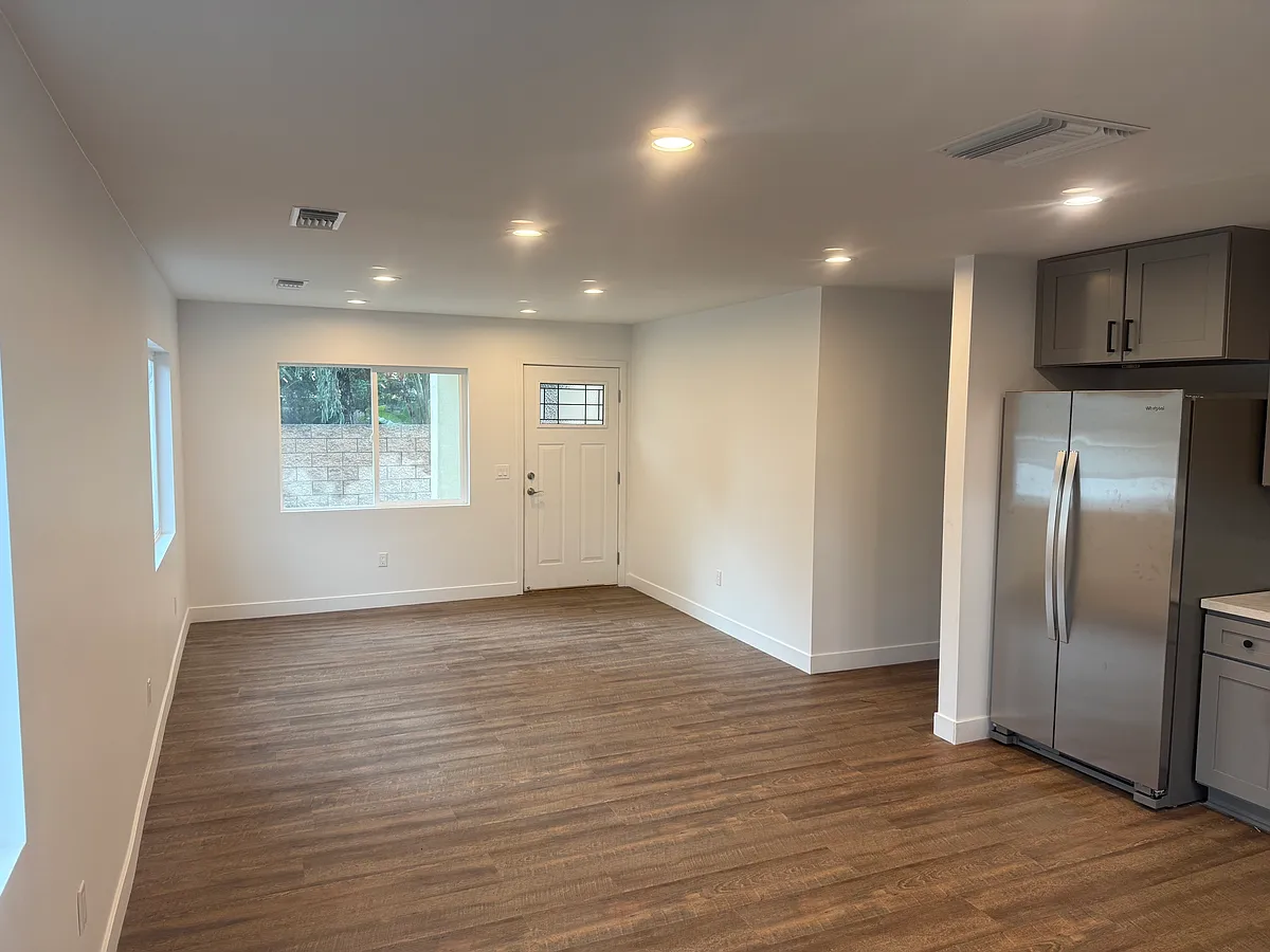 Spacious Living Area, Open Floor Plan, with an abundance of natural light. - 6515A Bear Ave