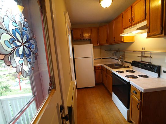Kitchen and rear exit to back yard.
