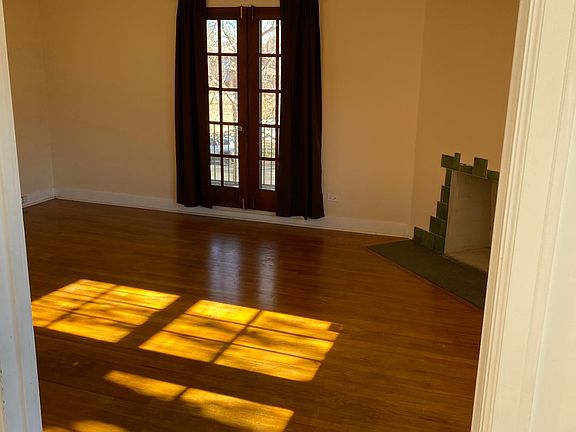 Balcony door and living room from dining room