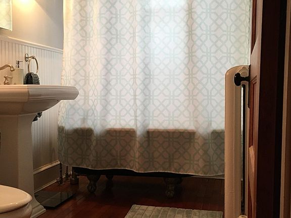 Bathroom with claw foot tub