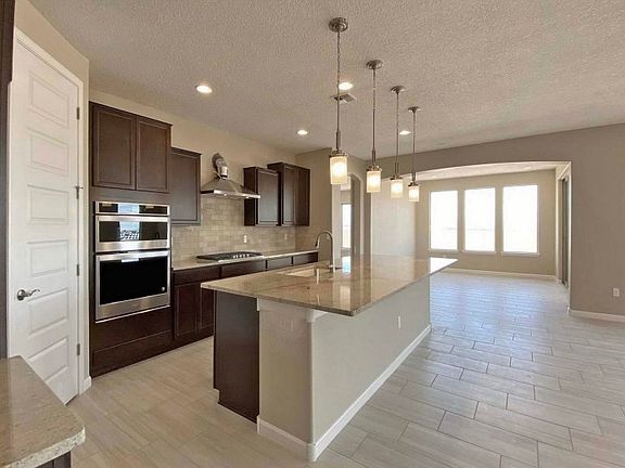Kitchen Overlooks Gathering Room