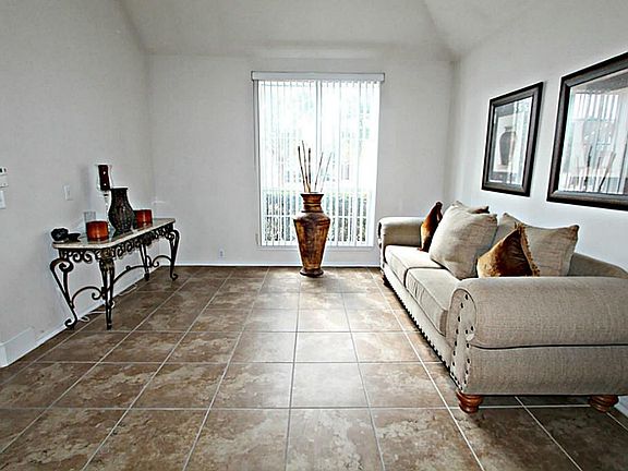 THE FORMAL LIVING ROOM IS THE PERFECT SPOT FOR INTIMATE GATHERINGS