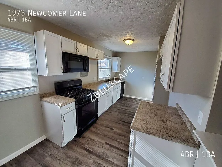 1973 Newcomer Ln — Photo 5