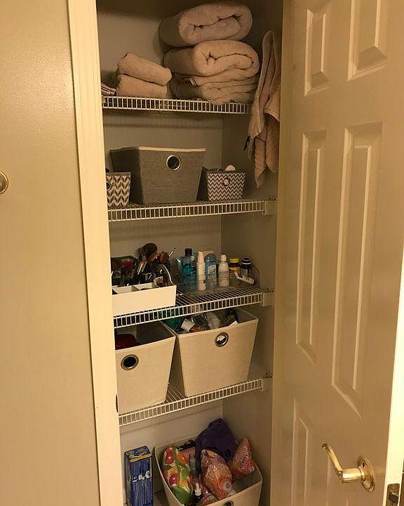 Storage closet in bathroom