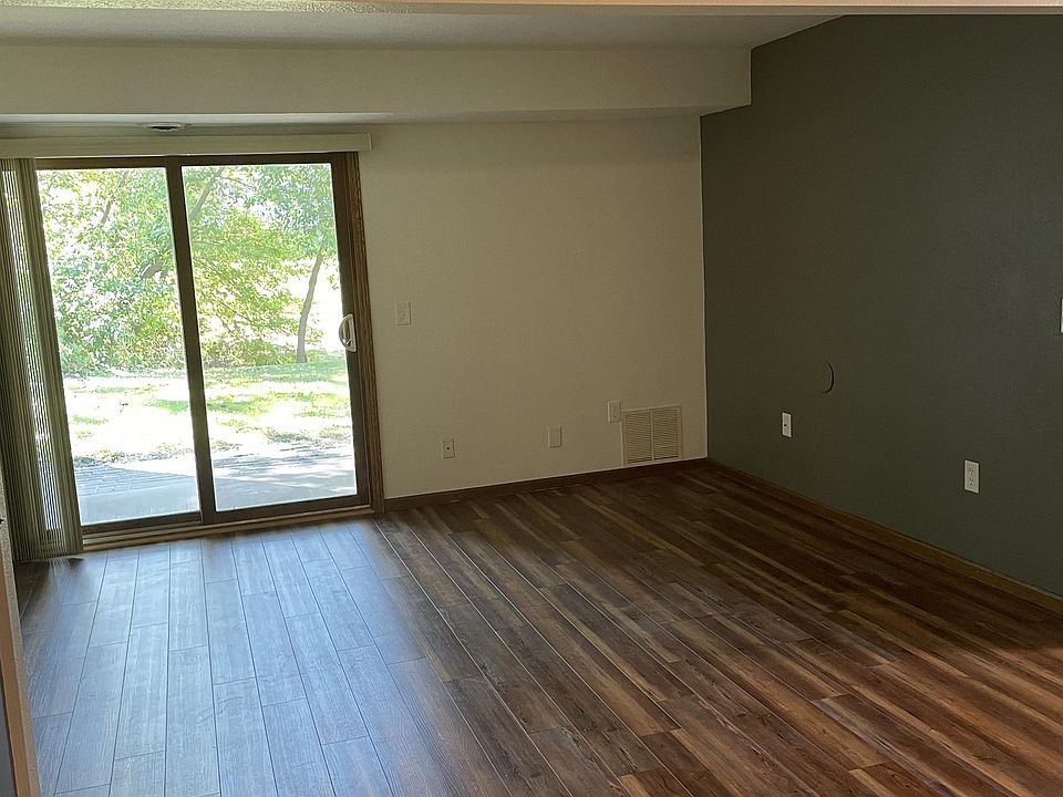 Living room with private patio access.