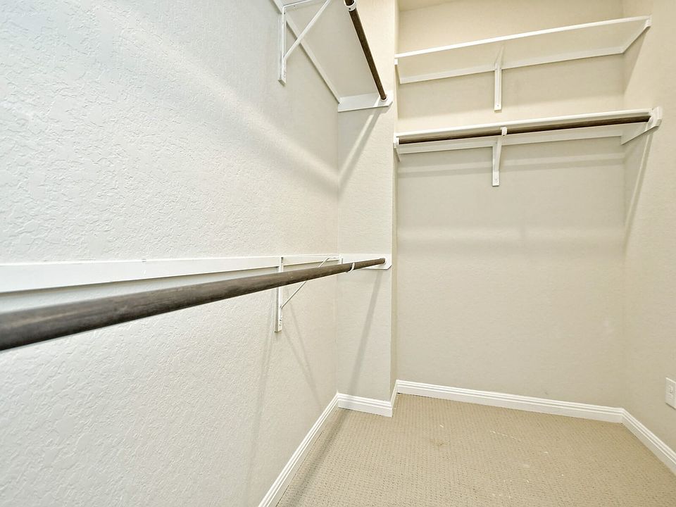 Primary Suite Walk-In Closet