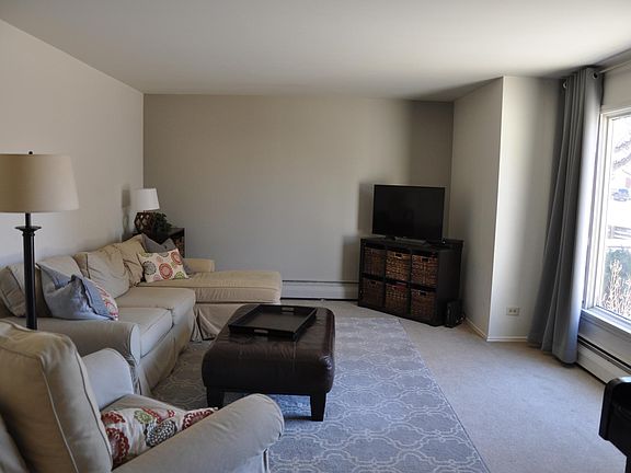Large, bright living room in the front of the house