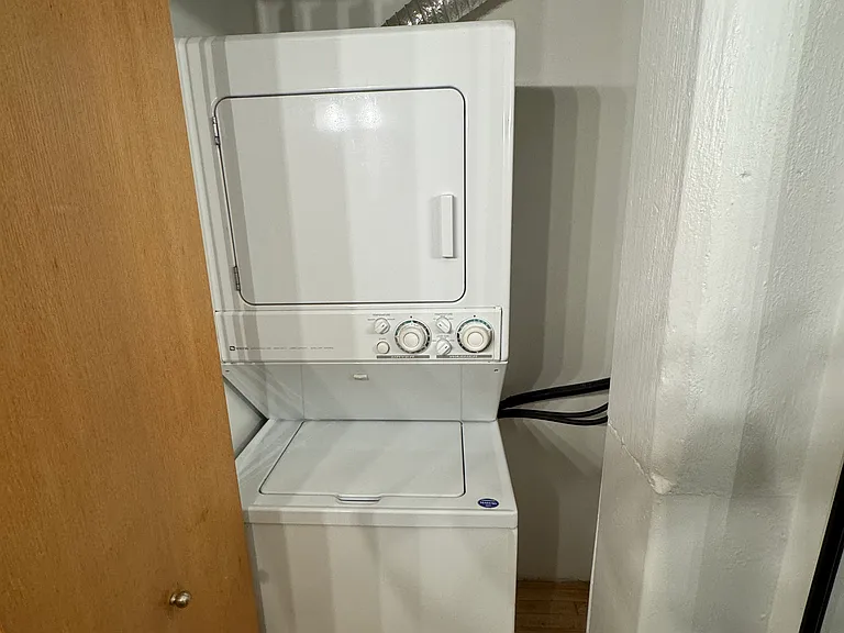 In unit washer/dryer in bathroom closet