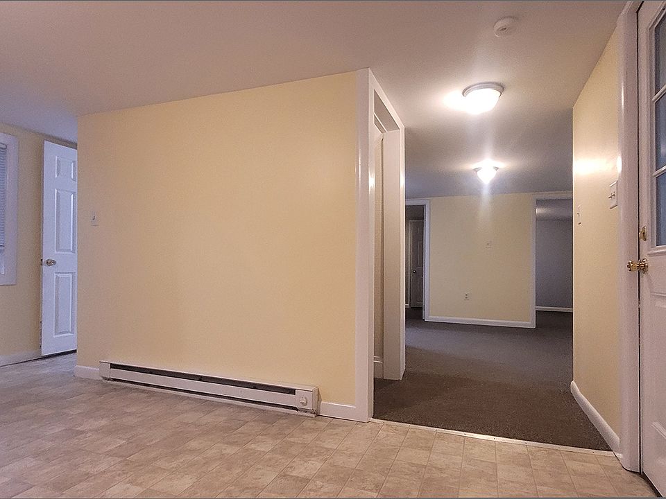 Kitchen with view into living room
