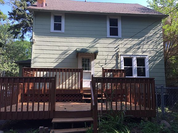 Back of house and deck. Space for garden.