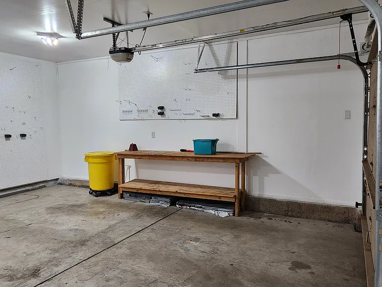 Workbench and pegboard in garage