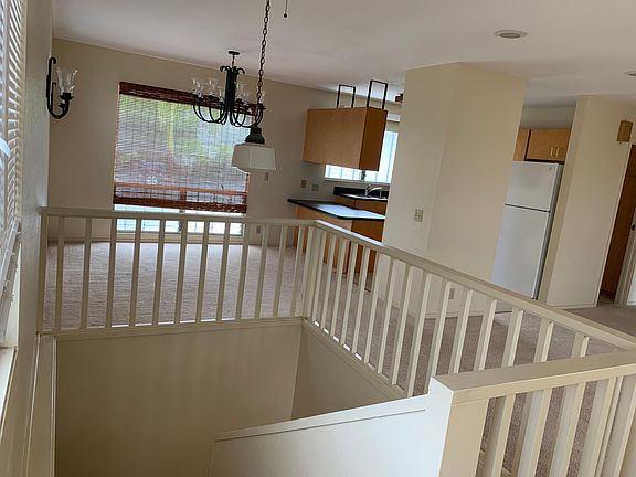 view froth of stairs of dining kitchen area