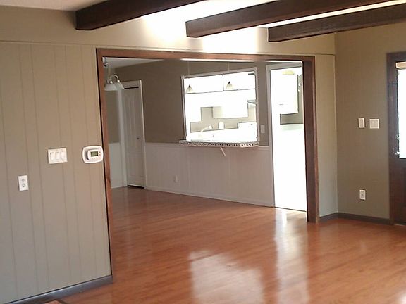 Look from Family Room to Kitchen and Dining Area