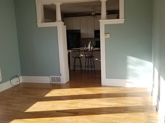 Living room, view into kitchen