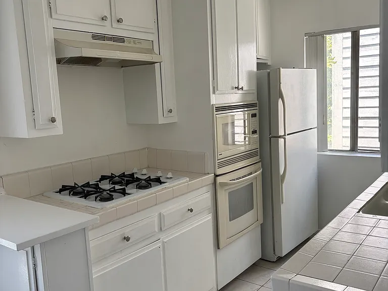 Stovetop, vent, mircowave, oven and refrigerator