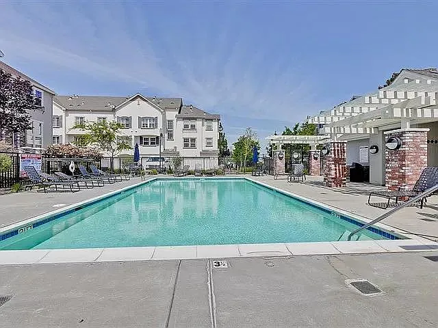 The house faces the pool