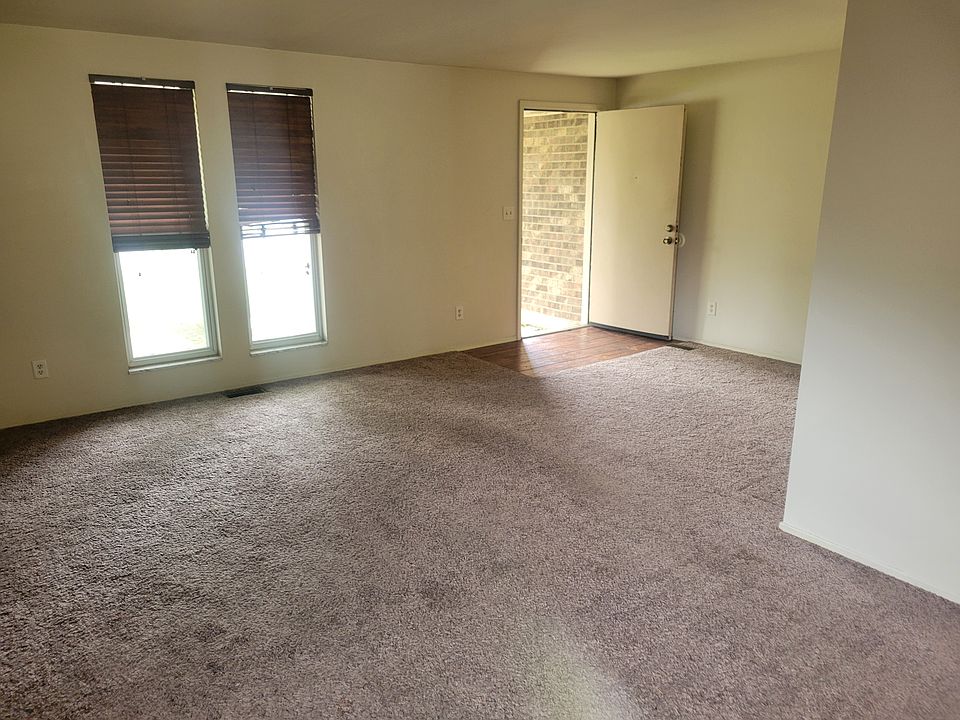 Front door entry - living room w/fireplace