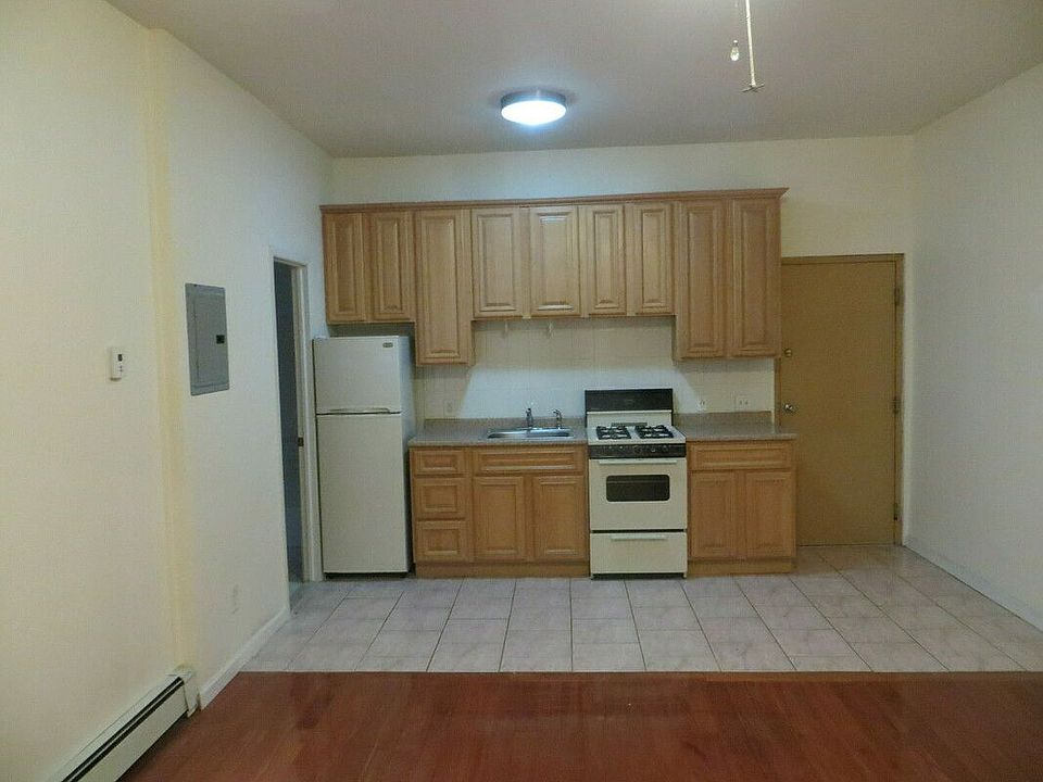 1st image of 8711 5th Ave #1REAR