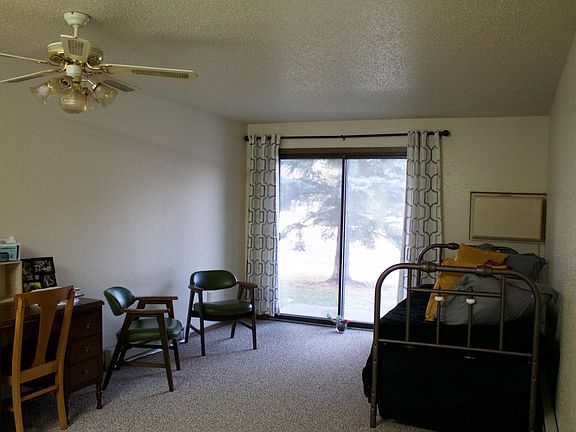 Living room area. Sliding glass doors that lead onto patio a