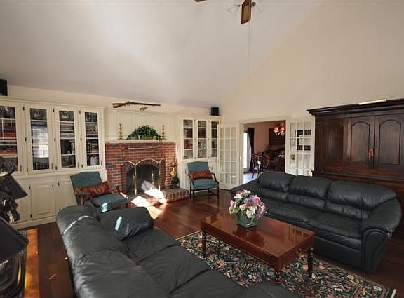 Family room with fireplace and built in cabinetry