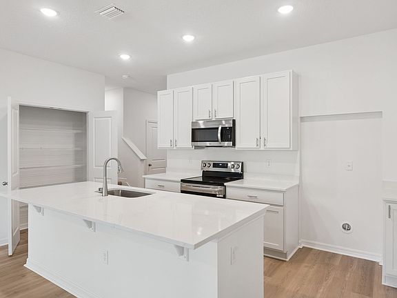 42 Cabinets, Stainless Steel Appliances, and Large Pantry